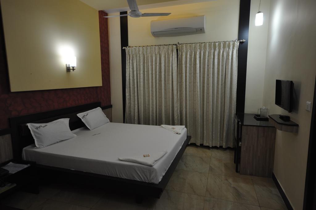 Vijey Hotels Tiruchirappalli Værelse billede